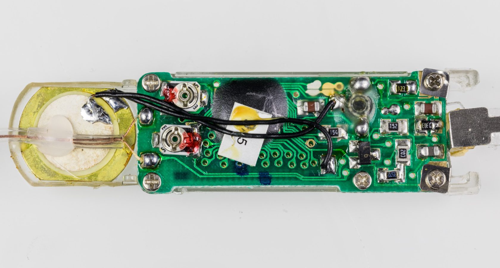 Populated circuit board from a medical diagnostic device, showing precision SMT assembly
