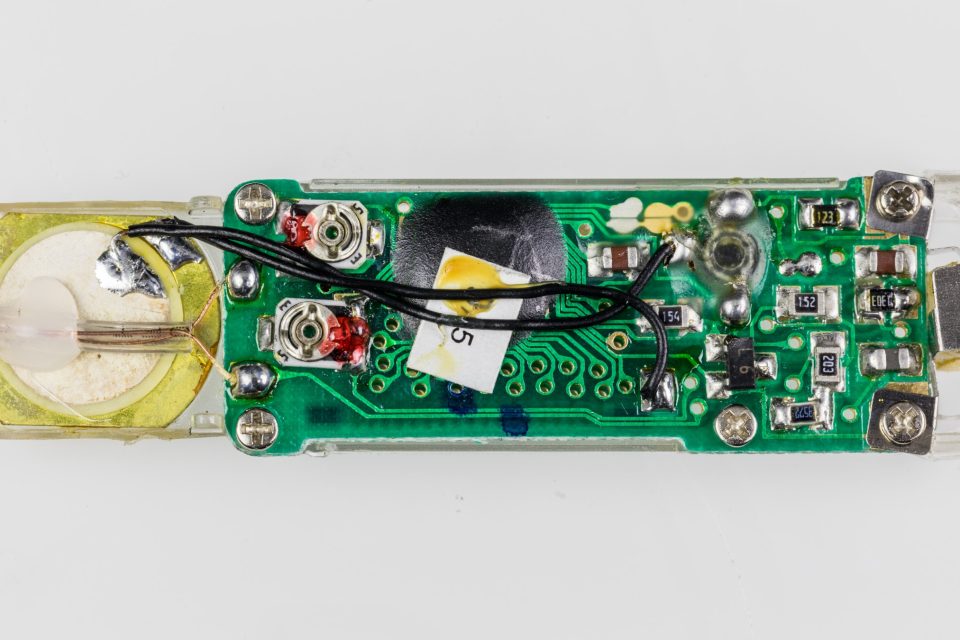 Populated circuit board from a medical diagnostic device, showing precision SMT assembly